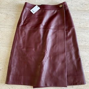 Coach leather skirt with Turnlock.